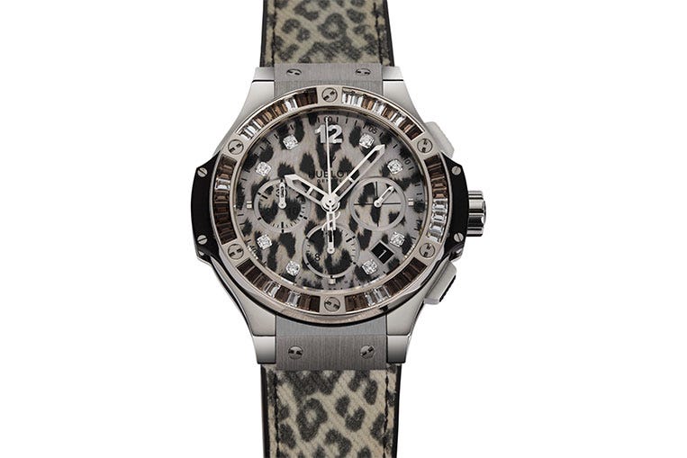 This big cat design borrows its look from the elusive snow leopard
